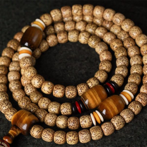 1723204443_374939bc-a426-4f6c-aef3-50ddf3ef9af3.jpg Moon Bodhi Seed Mala Bracelet – 108 Beads Meditation Spiritual