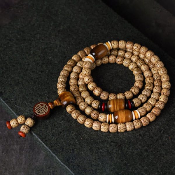 1723204444_f6fdf398-ab06-468d-b886-473f5a121062.jpg Moon Bodhi Seed Mala Bracelet – 108 Beads Meditation Spiritual