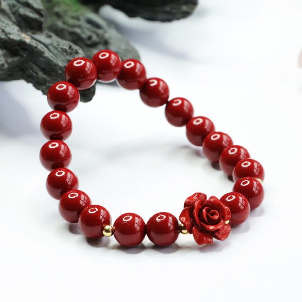 cinnabar traditional blessing bracelet flat lay photo