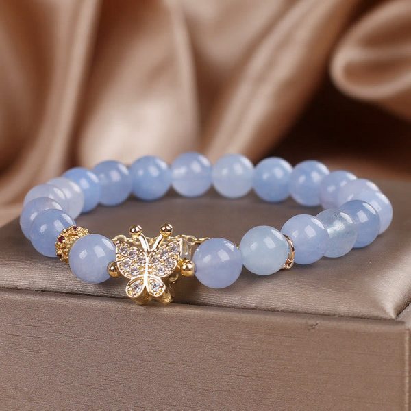 1728360174_2d3be1ae-f80b-4b9b-9bdf-c819ae105600.jpg blue chalcedony healing bracelet worn on wrist