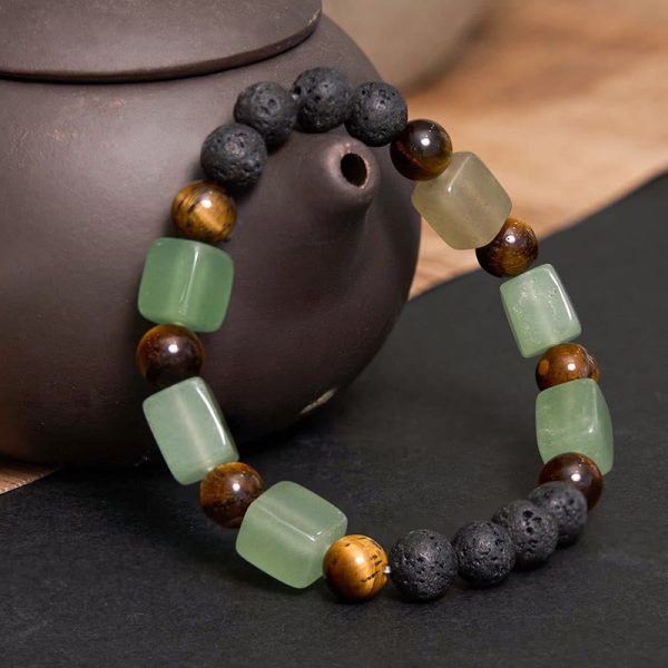 1728977528_1ca595ff-e08a-4372-84c8-dfe304fb2574.jpg lava stone balance bracelet natural stone close up
