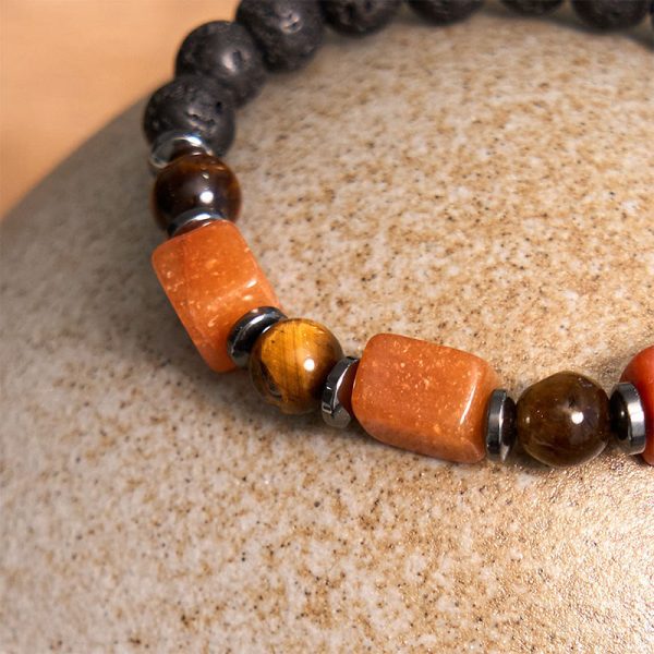 1728977529_4978aeb3-7b72-4f0e-9980-e6df2685d0b4.jpg lava stone energy bracelet natural bead texture