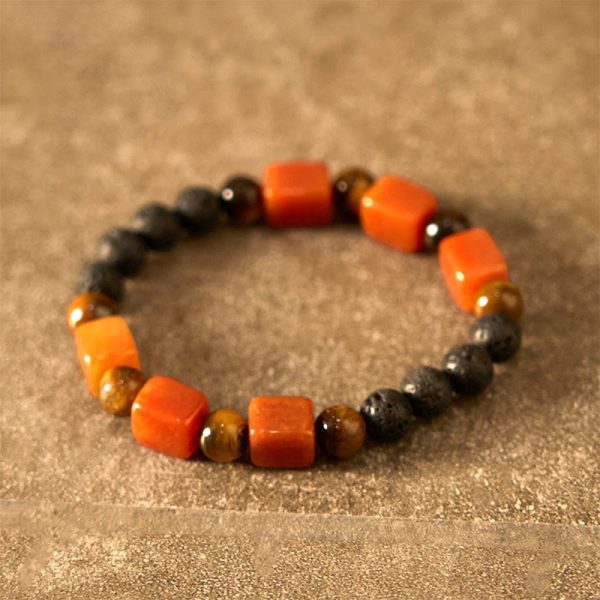 1728977529_7d357dc0-6d0e-4af4-8562-505d65b0e60d.jpg lava stone healing bracelet flat lay