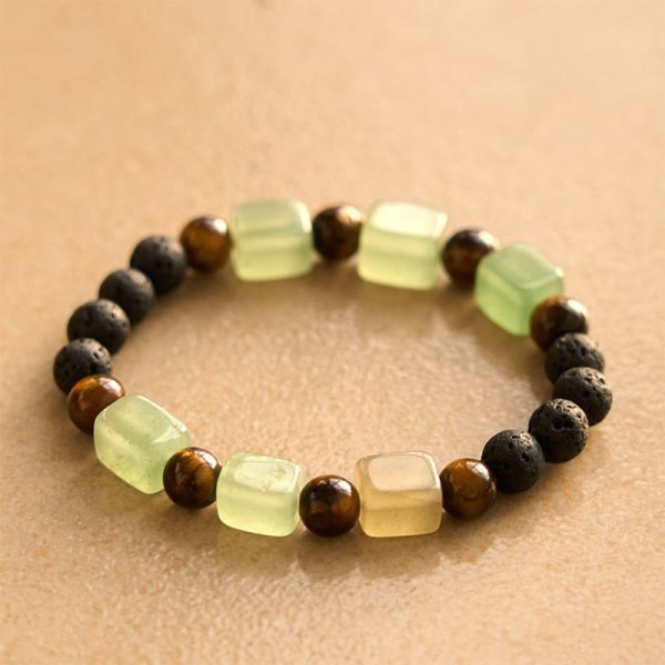 1728977529_c5228f8c-5676-46a3-892a-91715095c297.jpg lava stone protection bracelet flat lay product