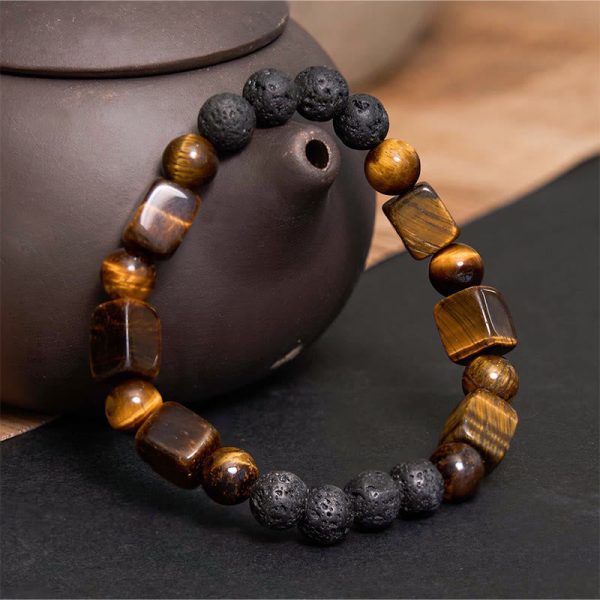 1728977530_57ef7284-2c1b-4cb4-9641-ebca8a6e84bd.jpg lava stone tiger eye energy bracelet detail view