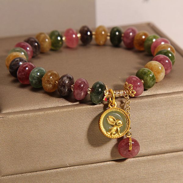 tourmaline buddha bracelet flat lay product photo