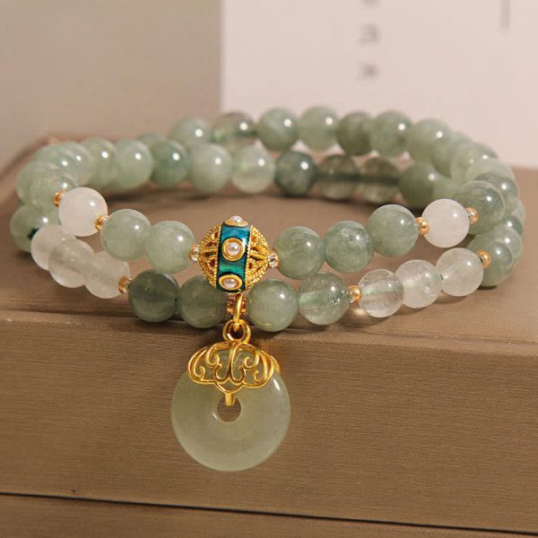 green jade buddha bracelet natural stone texture detail