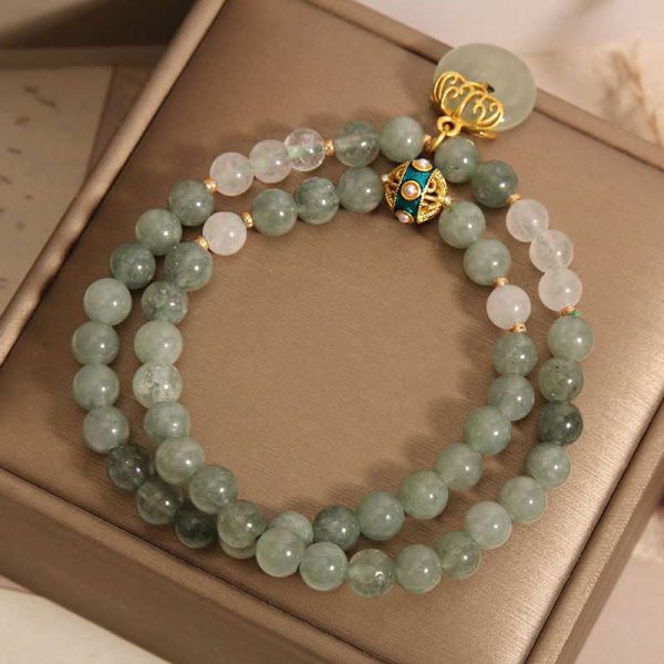 green jade buddha bracelet crystal bead detail close up
