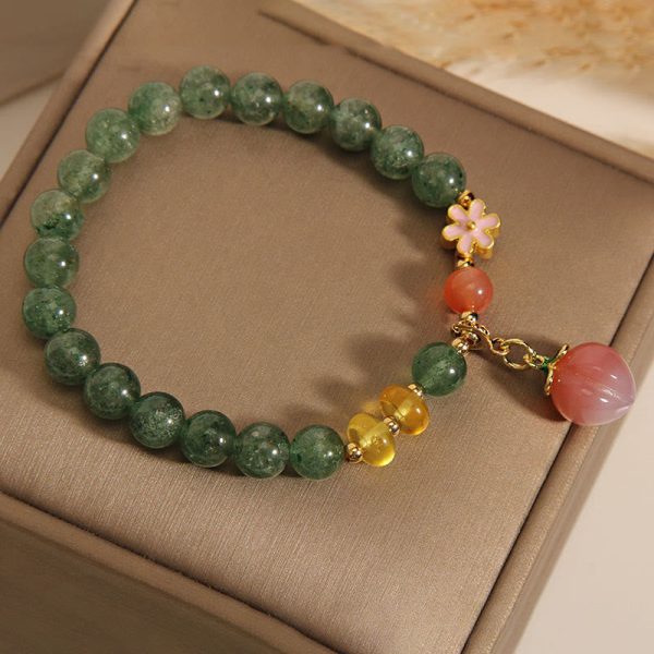 6eee765cb72dd2503f704f8f53a219e7.jpg green aventurine bracelet charm pendant close up