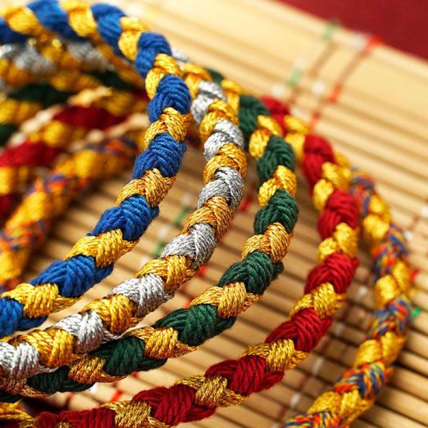 7301516632c35903f28ddb096cd520cc.jpg Tibetan Prayer Wheel Bracelet – Six Mantra Protection Cord
