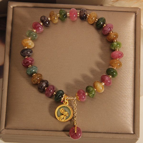 tourmaline buddha bracelet crystal bead close up detail
