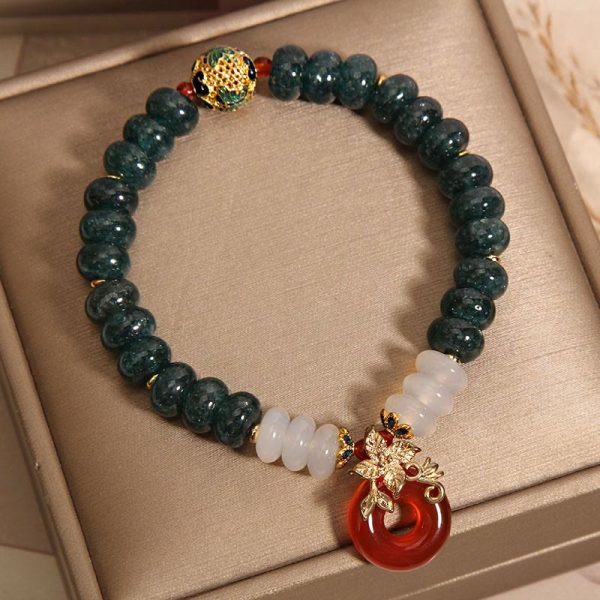 green aventurine crystal bracelet flat lay product photo