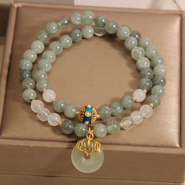 green jade protection bracelet buddha charm detail