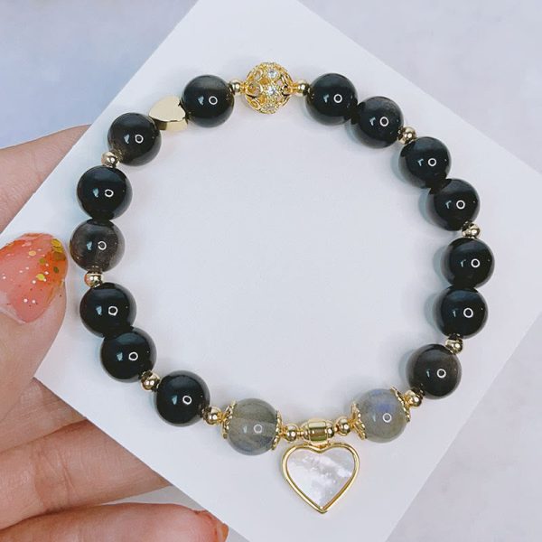 b0fbe8100de5ea040d074cf1f632e11e.jpg Obsidian Zodiac Buddha Bracelet β Protection & Karma Energy