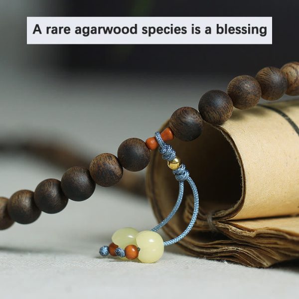 c76963d805b129bc71a694f2254beac3_1727b491-655b-4db2-a352-c269c7050ca8.jpg Sandalwood Meditation Mala Bracelet – 108 Beads Spiritual Energy Jewelry
