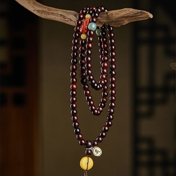 red sandalwood mala bracelet bead texture close up