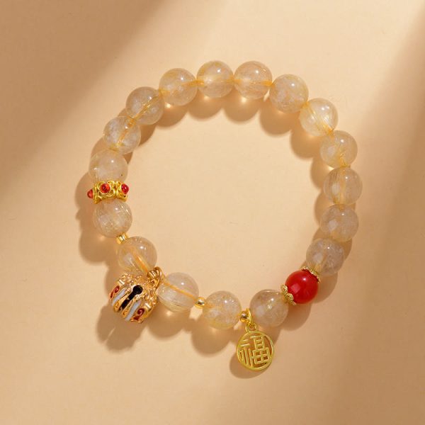 f35af9a708038a0d59d5a6f2b263eb5a.jpg Golden Rutilated Quartz Crystal Bracelet – Natural Healing Gemstone Bead Bracelet for Wealth Attraction, Abundance & Manifestation