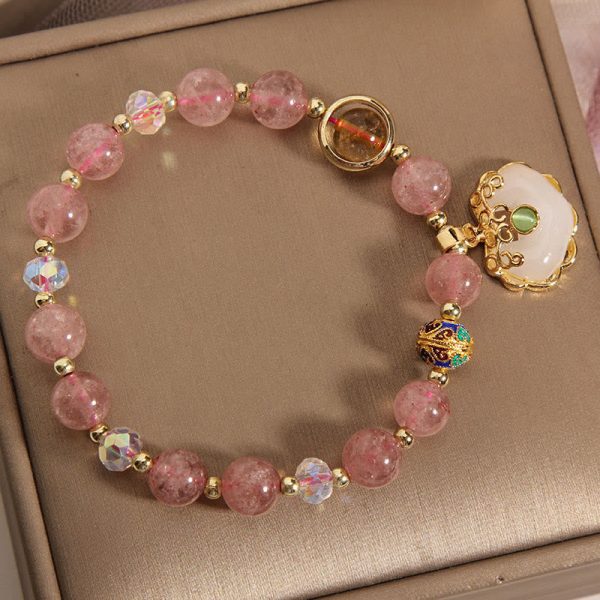 f7b46e0c8cbb9e2b58ec47f729680a2d.jpg strawberry quartz pink crystal bracelet bead detail