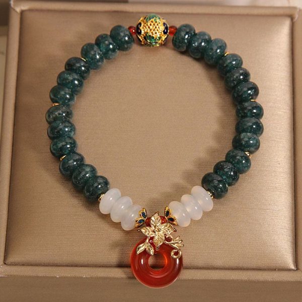 green aventurine luck protection bracelet worn on wrist